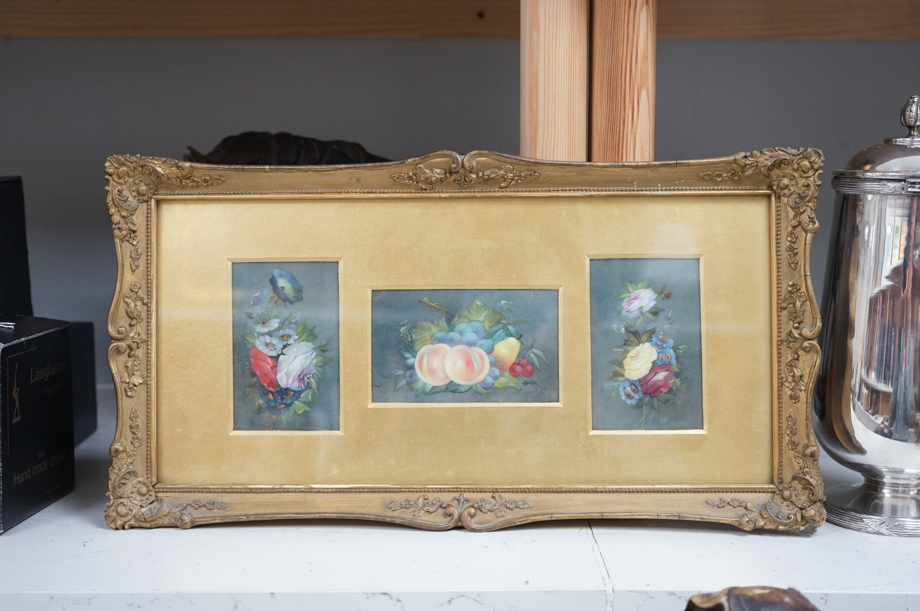William Rayworth (1852-1908), set of three still lifes, Flowers and fruit, mounted and framed as one, each indistinctly signed, 10 x 6cm, gilt framed